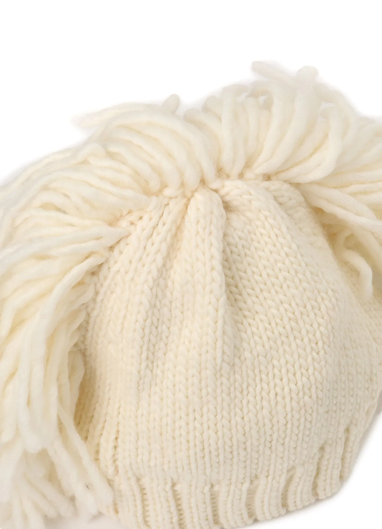 KNITTED WOOL JERSEY HAT WITH TASSELS AND SPIKES